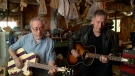 Brian Monty (left) and pal Terry Gillespie jam in Monty's guitar shop in Ste-Anne-De-Prescott, Ontario, May 5th, 2015