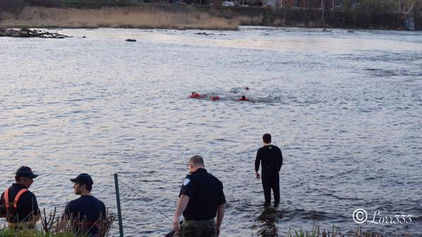 MAN PULLED TO SHORE