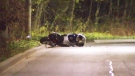 A motorcycle lies on its side following a fatal crash on Rosedale Valley Road on Thursday, May 7, 2015. 