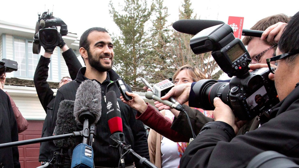 Omar Khadr speaks to reporters