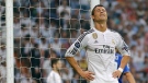 Real Madrid's Cristiano Ronaldo reacts after missing a chance to score during the Champions League match against Juventus, at the Santiago Bernabeu stadium in Madrid, on Wednesday, May 13, 2015. (AP Photo/Daniel Ochoa de Olza)