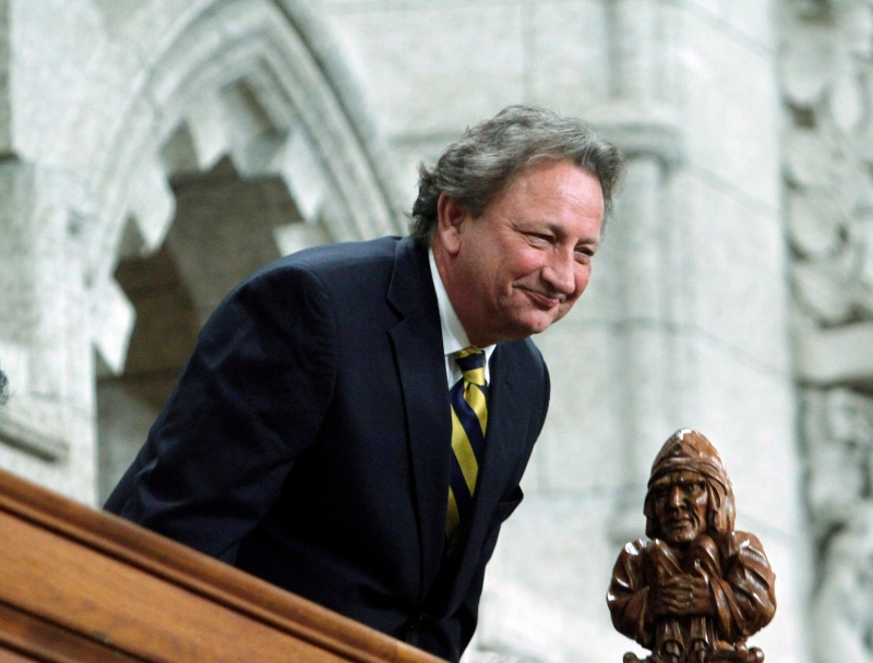 Eugene Melnyk, owner of the NHL's Ottawa Senators, stands in the visitors gallery as he is recognized in the House of Commons at the conclusion of question period on Parliament Hill, in Ottawa, Tuesday, March 4, 2014. (Fred Chartrand / THE CANADIAN PRESS)