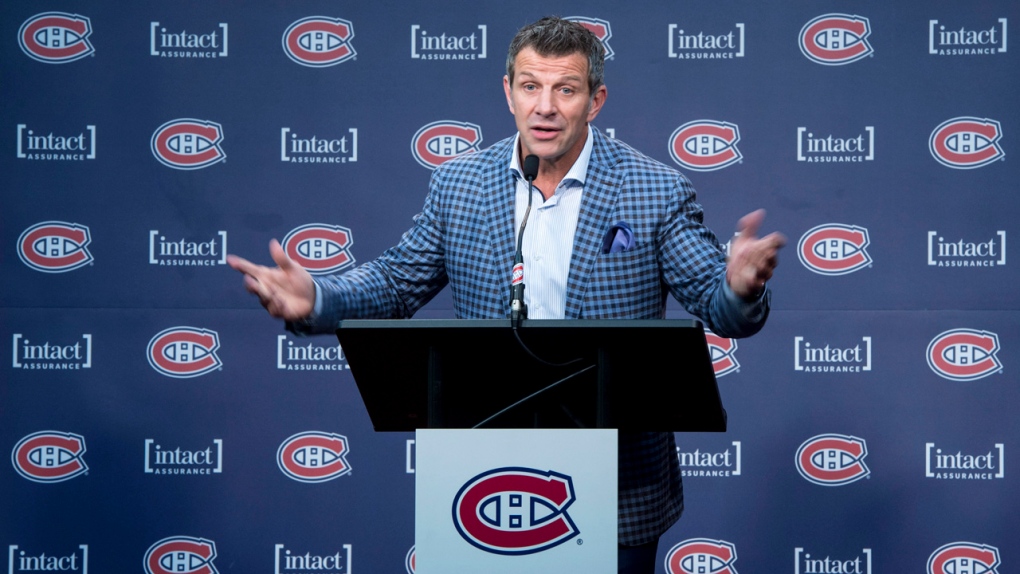 Marc Bergevin responds during a news conference