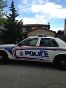 A London police cruiser sits on Applegreen Grove after a five-year-old girl was stabbed on Tuesday, May 19, 2015. (Celine Moreau / CTV London)