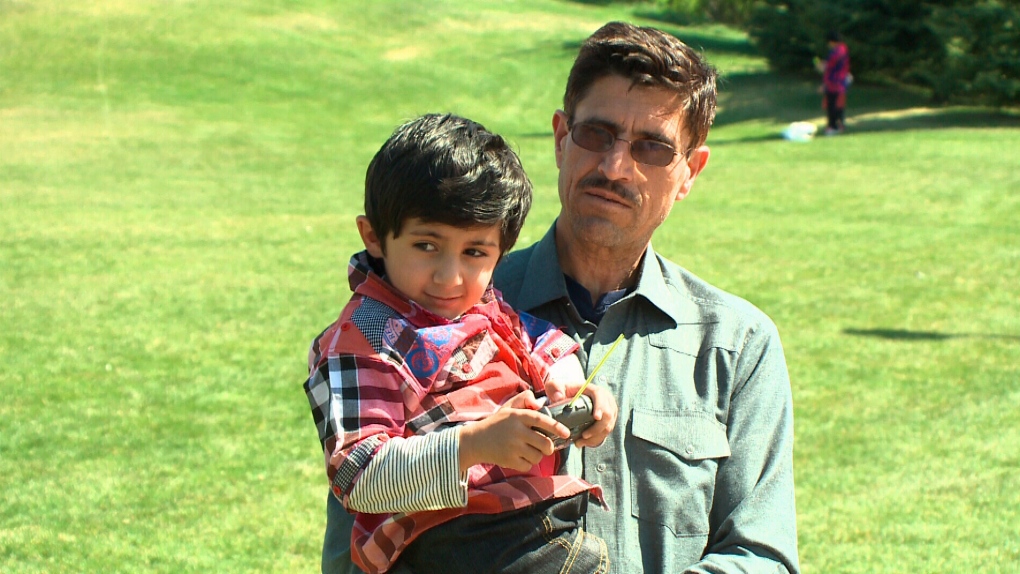 Four-year-old Ajjab Afridi and his adoptive father