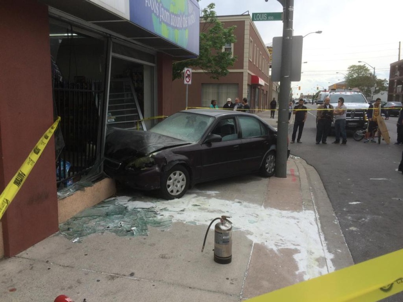 A car crashed into a store on Wyandotte Street East in Windsor, Ont., on Thursday, May 21, 2015. (Dan Appleby / CTV Windsor)