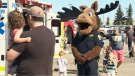 Medic Moose greets Calgarians during a station open house during the 2014 National Paramedic Services Week
