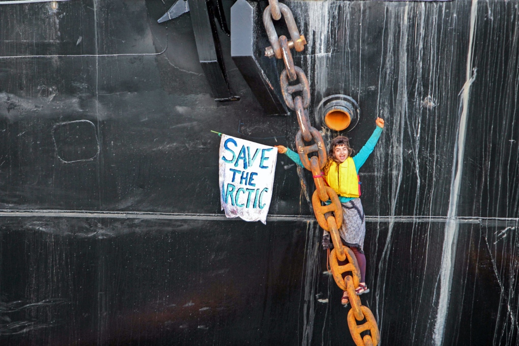 Woman chained to Shell support ship