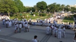1201 people enjoy dinner at the Manitoba Legislature, sitting at one of the longest tables in the world.
