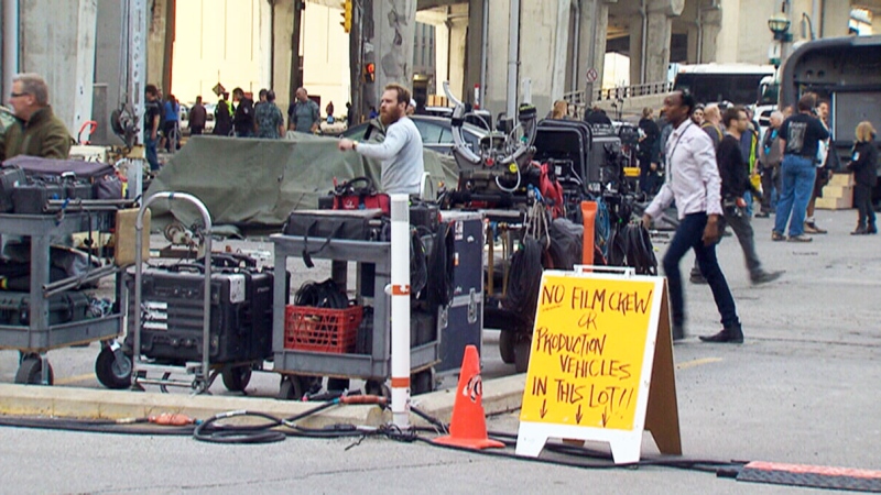 A film crew works in Toronto on Tuesday, May 26, 2015. 