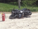 A motorcycle rests at the scene of a fatal crash on Line 40 near Stratford on Wednesday, May 27, 2015. (Marc Venema / CTV Kitchener)