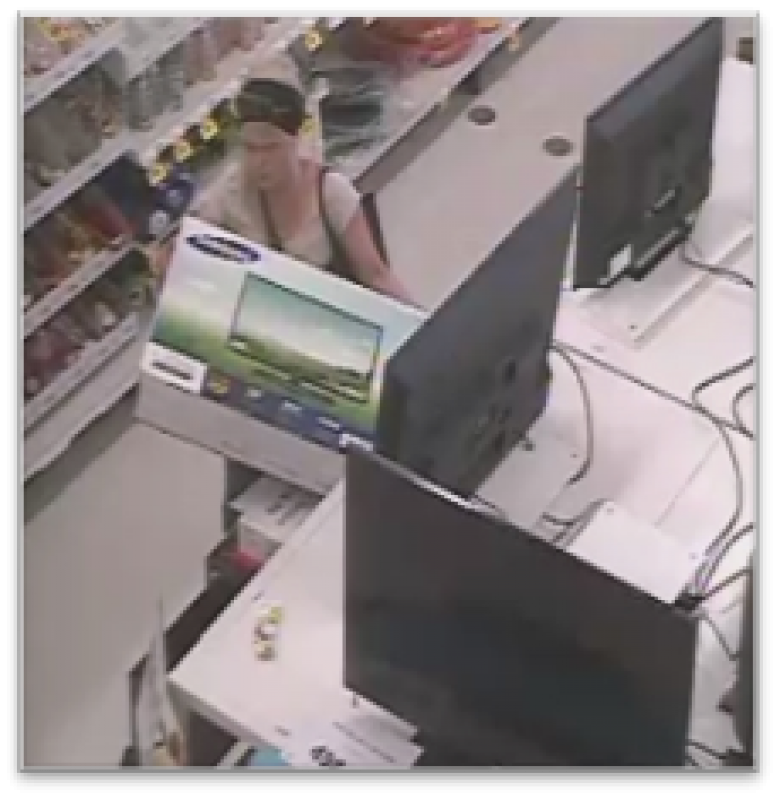 A female suspect is shown on security footage from a Real Canadian Superstore in Norfolk County on Sunday, May 24, 2015. 
