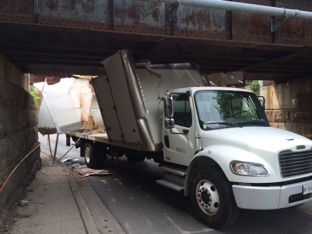 A truck is wedged under the Talbot Street bridge in London, Ont, on Friday, May 29, 2015. (Reta Ismail / CTV London) 