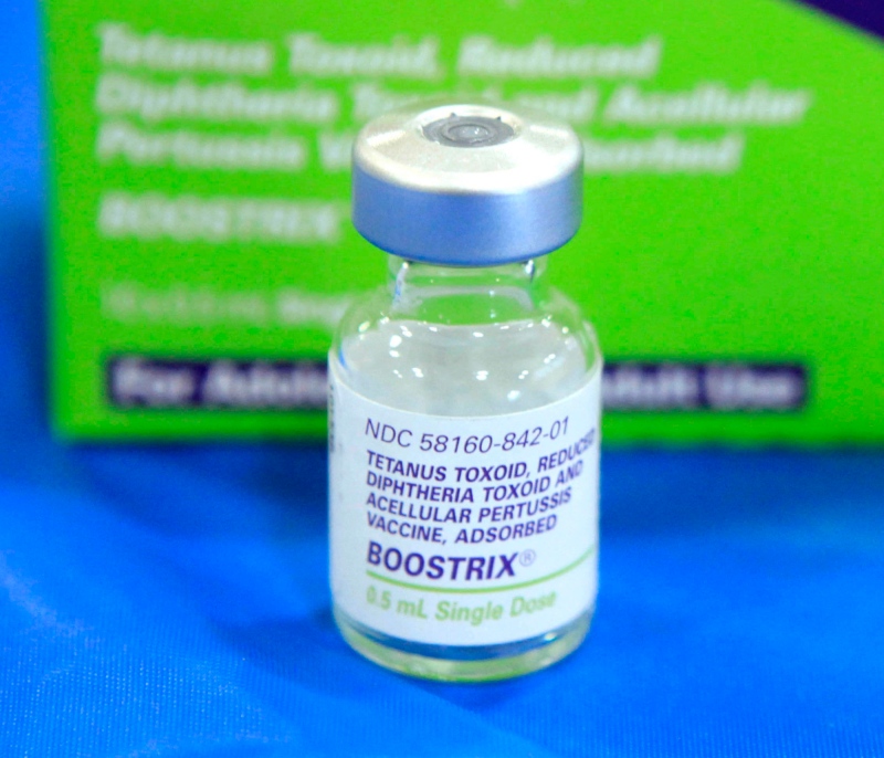 This Monday, Sept. 19, 2011 file photo shows an empty bottle of Tetanus, Diphthera and Pertussis, (whooping cough) vaccine at Inderkum High School in Sacramento, Calif. (Rich Pedroncelli / THE ASSOCIATED PRESS)