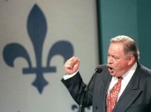 Then-Quebec Premier Jacques Parizeau gestures during his speech to 'Yes' supporters after losing the referendum in Montreal on Oct. 30, 1995. (Ryan Remiorz / THE CANADIAN PRESS)