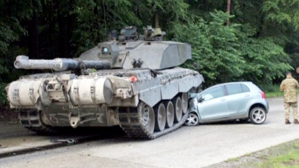 Tank crushes car in Germany