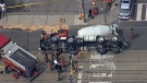 A cement truck lies on its side in downtown Toronto, as seen from the CTV News chopper on Friday, June 5, 2015. 