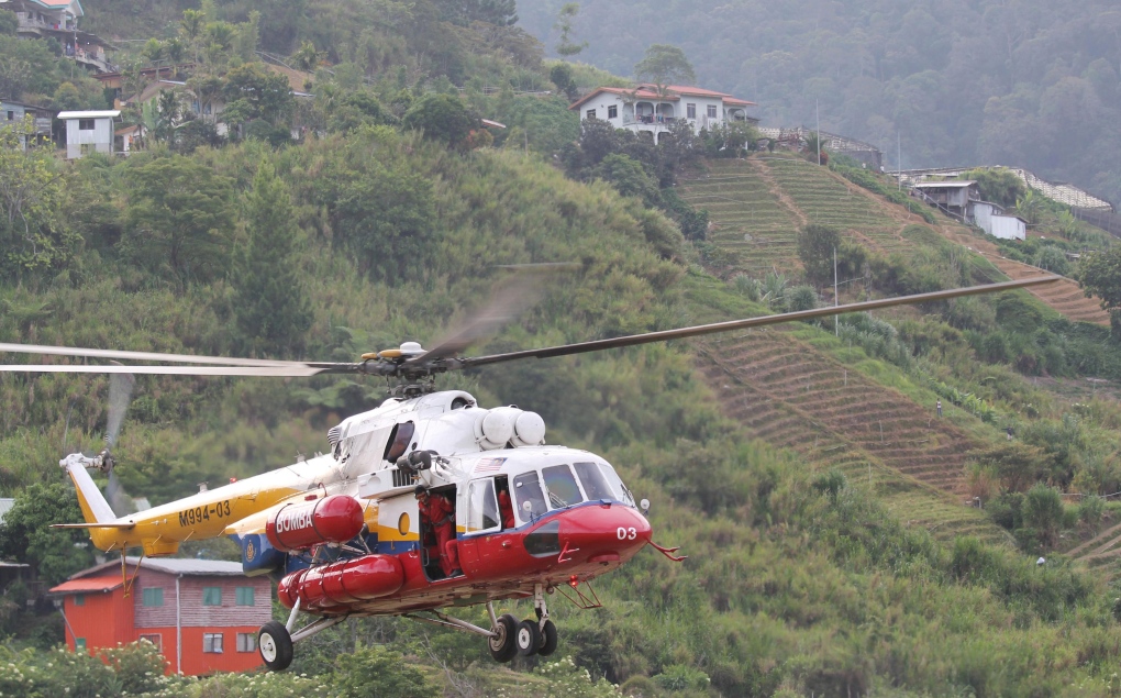 Helicopter searches for climbers in Malaysia
