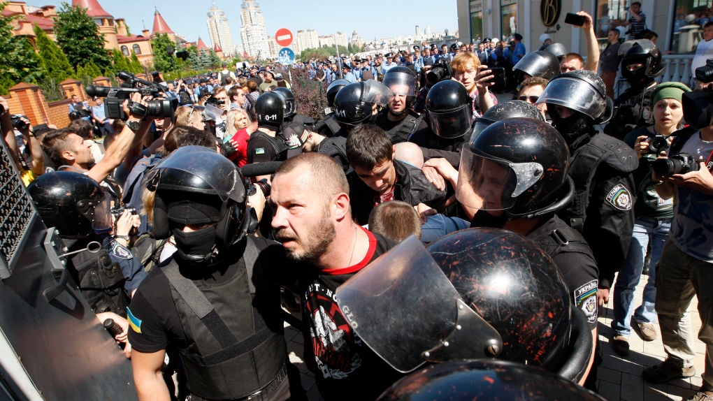 Police clash with gay rights opponents in Kyiv