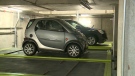 Moving platforms are used to park cars in Ottawa's first puzzle parking garage, June 8, 2015