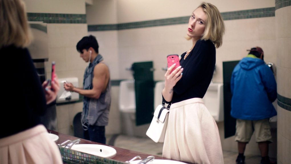 Transgender woman in male bathroom