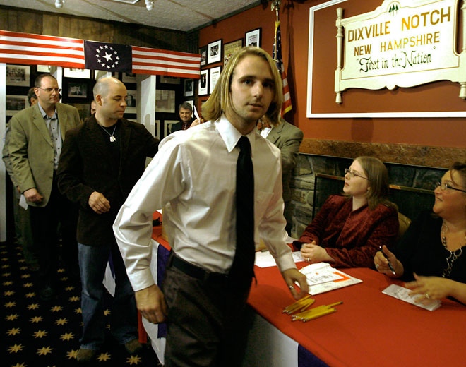 First voter, Tanner Tillotson, front centre, of Dixville Notch cast his ballot at the nation's presidential election in Dixville Notch, N.H. Tuesday Nov. 4, 2008. (AP / Cheryl Senter) 