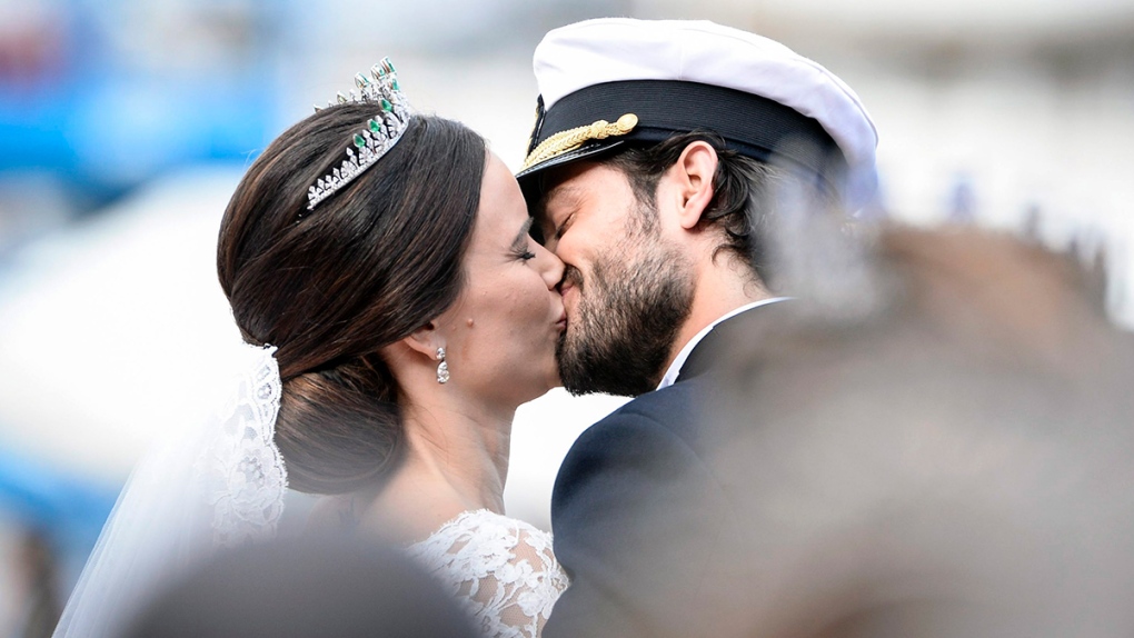 Sweden's Prince Carl Philip kisses Sofia Hellqvist