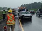 Emergency crews can be seen at the scene of a crash on Highway 400, near Port Severn, Ont. on Sunday, June 14, 2015. (Steve Mansbridge/ CTV Barrie)