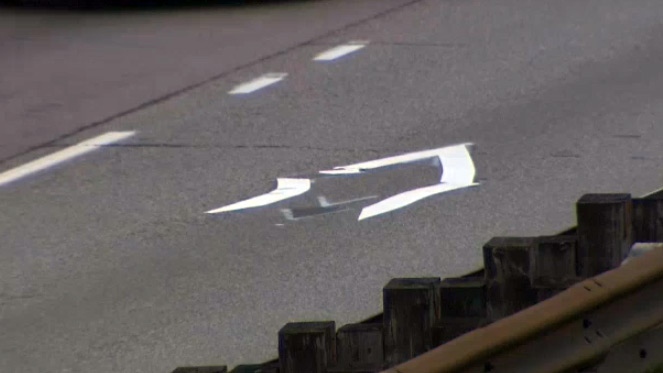 HOV lane markers peeling off