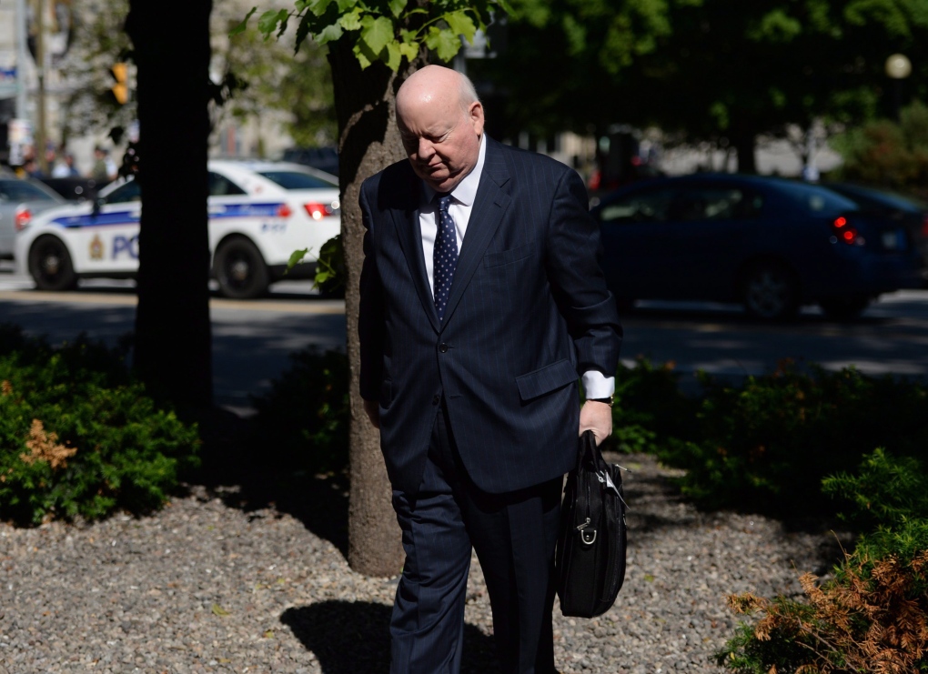 Mike Duffy arrives to trial on June 15, 2015