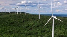 FILE- Wind turbines are seen on Stetson Mountain in Maine on July 14, 2009. (AP Photo/Robert F. Bukaty)