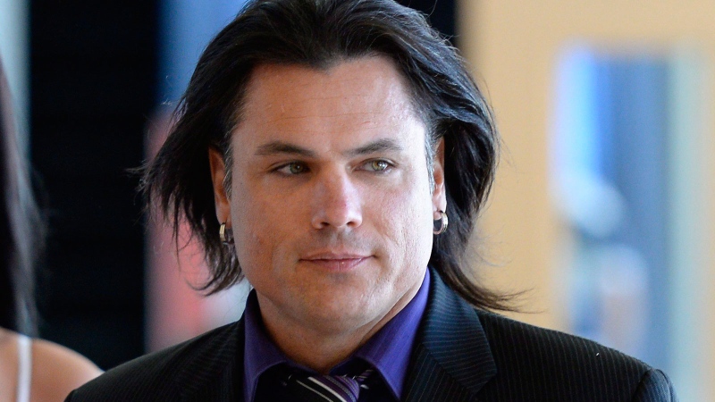 Suspended senator Patrick Brazeau arrives at the courthouse for his trial for allegations of assault and sexual assault from an incident in 2013, in Gatineau, Que., on Friday, June 19, 2015. (Justin Tang/THE CANADIAN PRESS)