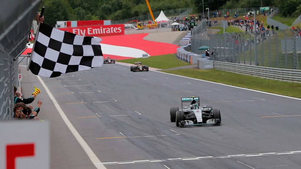 Nico Rosberg crosses the finish line
