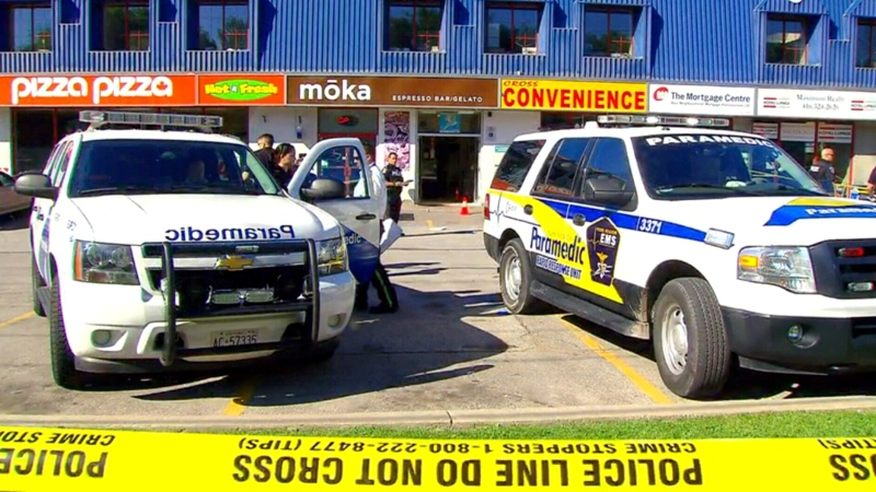 Police investigate a fatal shooting at Moka cafe in Vaughan, Ont., Wednesday, June 24, 2015.