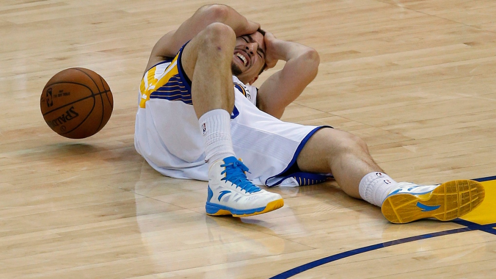 Klay Thompson after hitting his head on the court