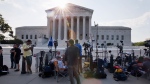 Television crews set up outside of the Supreme Court in Washington, on June 25, 2015. (AP / Jacquelyn Martin)
