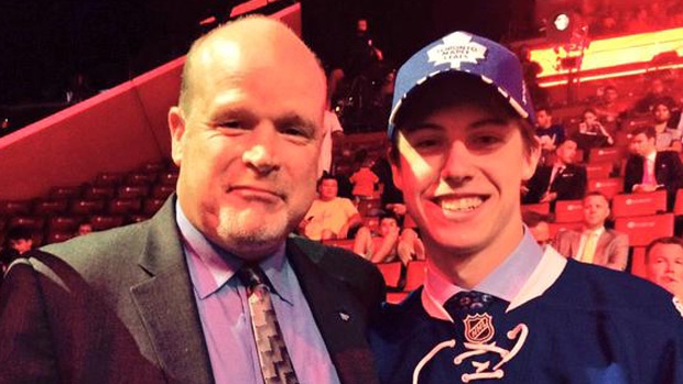 Mitch Marner, center, poses with Toronto Maple Leafs executives after being  chosen fourth overall during the first round of the NHL hockey draft,  Friday, June 26, 2015 in Sunrise, Fla. (AP Photo/Alan