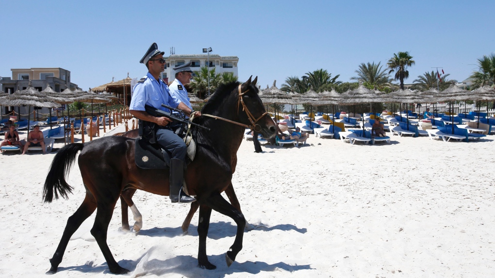 Mounted police in Tunisia on beach