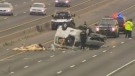 A teen is in hospital with serious injuries after a cargo van rolled over on the eastbound lanes of Highway 401 on June 30.
