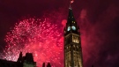 Fireworks explode behind the Peace Tower on Parliament Hill during Canada Day celebrations on Wednesday, July 1, 2015 in Ottawa. (Justin Tang / THE CANADIAN PRESS)