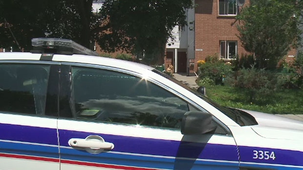 A police car sits outside a home on Rothbury Crescent where the savage beating of a man in a wheelchair took place around 12:30 p.m. on Wednesday, July 1st, 2015.
