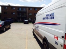 A police vehicle sits outside an apartment complex on Whitney Drive a day after a woman was stabbed to death in London, Ont. on Thursday, July 2, 2015. (Sean Irvine / CTV London)