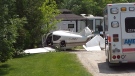 Two people suffered minor injuries when their plane crashed near the Rainbow Ridge Resort outside Grand Valley, Ont., on Friday, July 3, 2015. (Carl Boone)