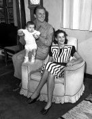 In this Sept. 9, 1947 file photo, actors Kirk and Diana Douglas pose with their second son, Joel, for his first portrait in the Hollywood district of Los Angeles. (AP)