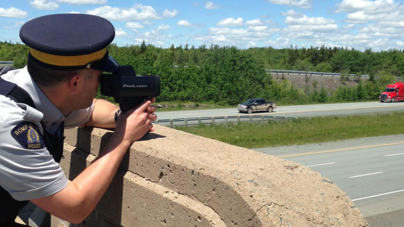 An RCMP officer checks for speeders on a Nova Scotia highway in this file photo.