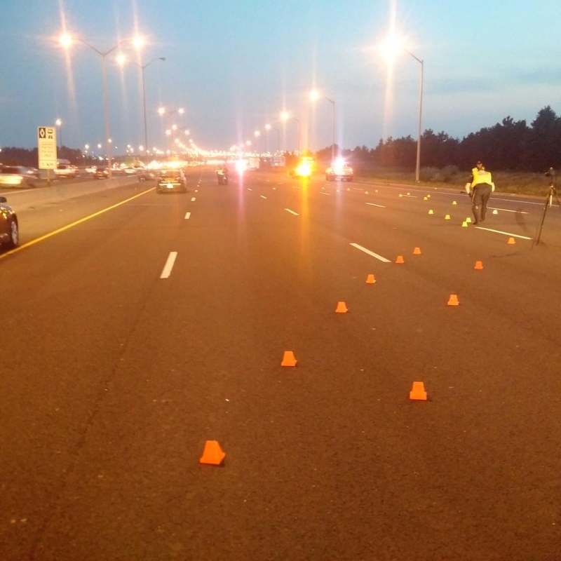 Police investigate the scene of a crash on Highway 401 west of Renforth Drive, on Monday, July 6, 2015. (Twitter / OPP)