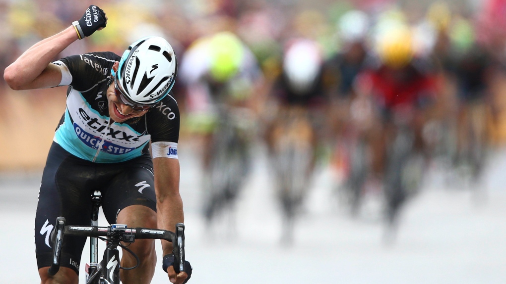 Tony Martin raises fist at Tour de France