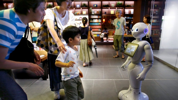 Family with Japanese robot