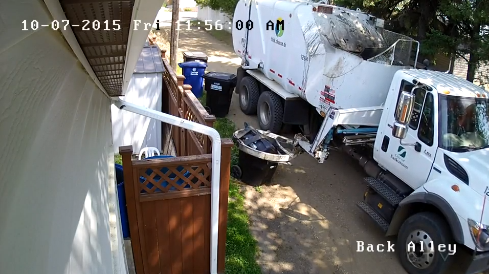 Garbage truck smashes can