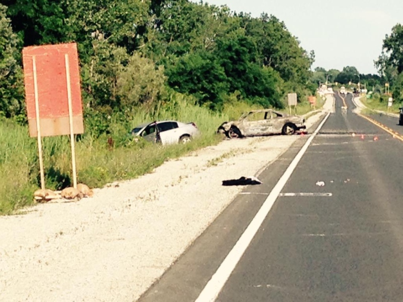 Two vehicles sit on the shoulder following a serious crash on Highway 3 in Leamington, Ont. on Wednesday, July 15, 2015. (Stefanie Masotti / CTV Windsor)